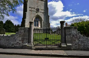 Churchyard gates, gate piers and approximately 3 metres of flanking walls approximately 10 metres to west of west tower of Church of St Andrew