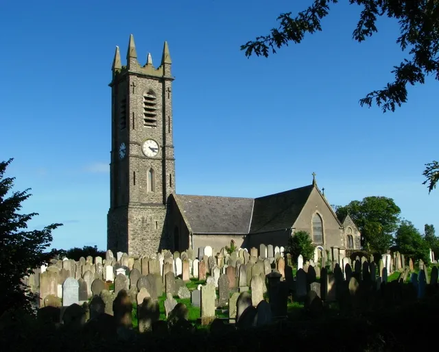 Donaghadee Parish Church Donaghadee Parish Church (Church of Ireland) and adjoining churchyard. The site of the church is believed to have been a place of worship since the time of the Druids. St Patrick is also believed to have visited when a stone church was erected (circa 5th Century AD), known as the Church of "Dofnachti". A more substantial building is thought to have been erected by John de Courcy c1177. This was rebuilt in 1626 by Hugh Montgomery and other Scottish settlers to the area during the Ulster Plantation. Built from local stone taken from Newry, Dundonald and Dungannon, the church was enlarged in 1881. The stone tower was built in 1833 by Captain Daniel De Lacherois and includes a bell weighing over a ton which was donated by the same family. The adjoining churchyard contains graves dating from the 17th Century, many in excellent condition. See https://www.geograph.org.uk/search.php?i=3453551 for some related images. See also the excellent archive of Bill Caldwell at http://www.graves1.homecall.co.uk/Donaghadee/FrameSet.htm for many images of the individual headstones.
