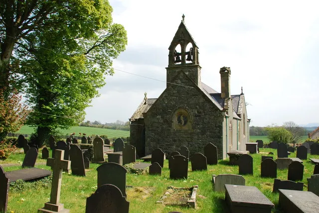 Eglwys Sadwrn Sant - St Sadwrn's Church Llansadwrn Sadwrn Farchog (Saturnus or Saturninus the Knight) was the brother of St Illtud. He married his cousin (later St Canna) and had a child who became St Crallo. Their gravestone is inscribed (reconstructed) HIC BEATUS (-) SATURNINUS SE(PULTUS) (I)ACIT ET SUA SA[NCTA] CONIU(N)X PA(X) (VOBISCUM SIT) (Here lies buried St Sadwrn with his blessed wife Peace be unto you).