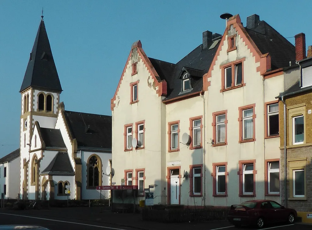 Protestant Church Konz-Karthaus, church (left) and former school (right)