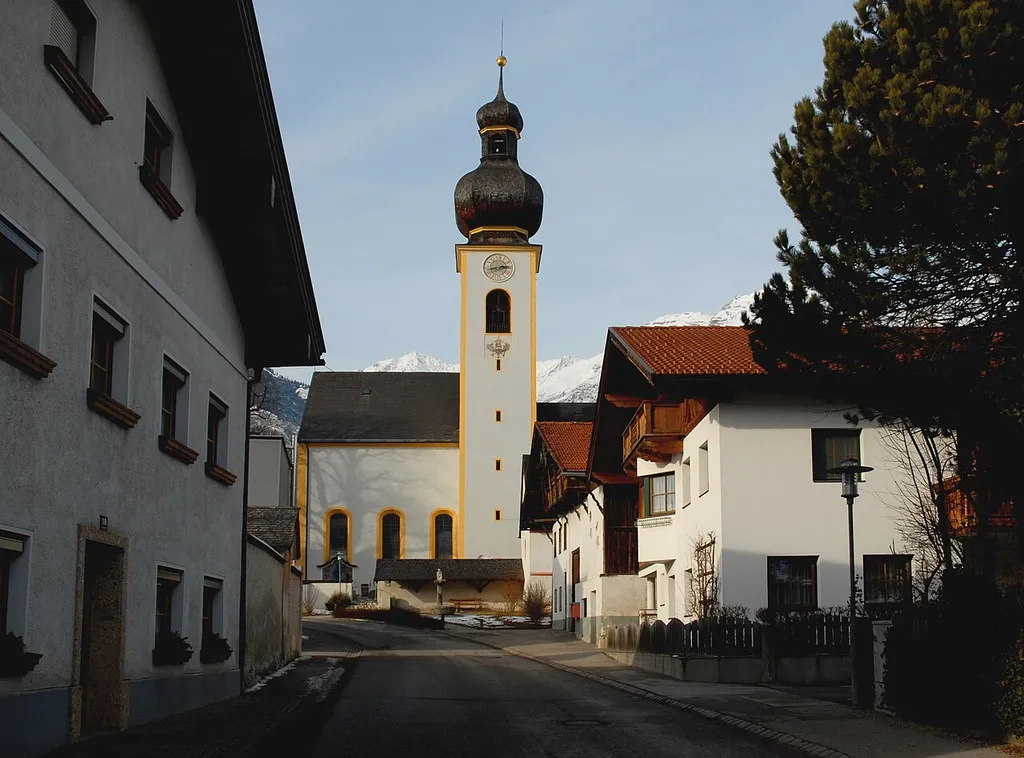 In the center of Mils near Hall in Tirol with parish church