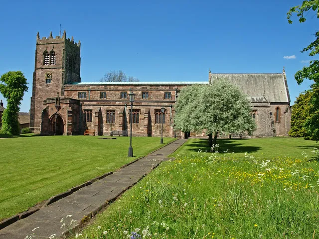 The Parish Church Kirkby Stephen, Cumbria Well kept grounds, nice to see a part of the grass left to grow naturally and seed.