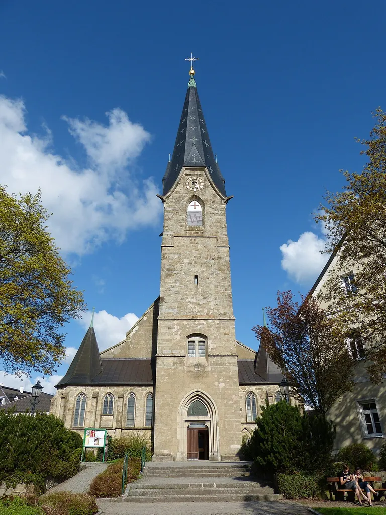 Bad Leonfelden ( Upper Austria ). Saint Bartholomew parish church: Facade with church tower ( 1877 ).