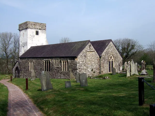 St Michael's Rudbaxton The original dedication was to St Madoc (whose well was in the churchyard) but the Normans may have changed the patron. Parts of the church are mediaeval although there have been later additions and restorations: it is a very attractive building with a simple lime-washed tower in a peaceful rural setting. It's also worth a detour for the monuments inside!