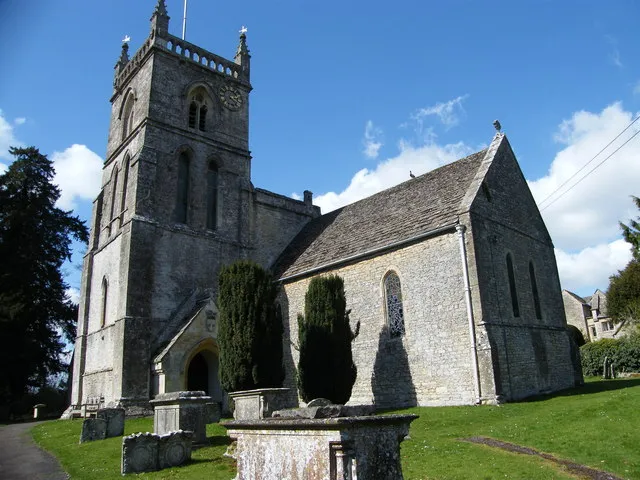 St John the Baptist parish church, Coln St Aldwyns, Gloucestershire. View from the southeast, showing the chancel and south tower.