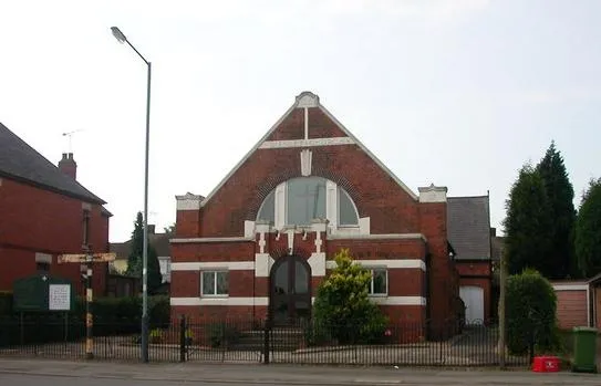 Ryton Methodist Church, Rugby Road, Bulkington, Warwickshire. Built in 1911. Note the rusty fingerpost on the left.