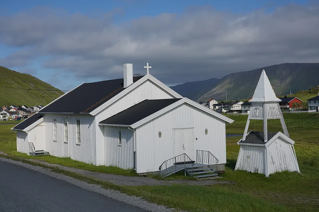 Church in Skarsvåg on the island of Magerøya in the Nordkapp municipality, Finnmark, Norway. The village, with a population of approximately 60, is considered the northernmost fishing village in the world. The church, built in 1961, is located on the main road of the village, which has a population of 60 and is considered the northernmost fishing village in the world.