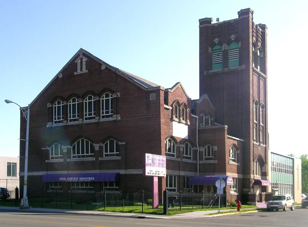 The historic First United Methodist Church in Highland Park, Michigan, United States is listed on the US National Register of Historic Places. The church building is currently occupied by Soul Harvest Ministries. In this photo, it is seen from across Woodward Avenue. This is an image of a place or building that is listed on the National Register of Historic Places in the United States of America. Its reference number is 82002918 (Wikidata).