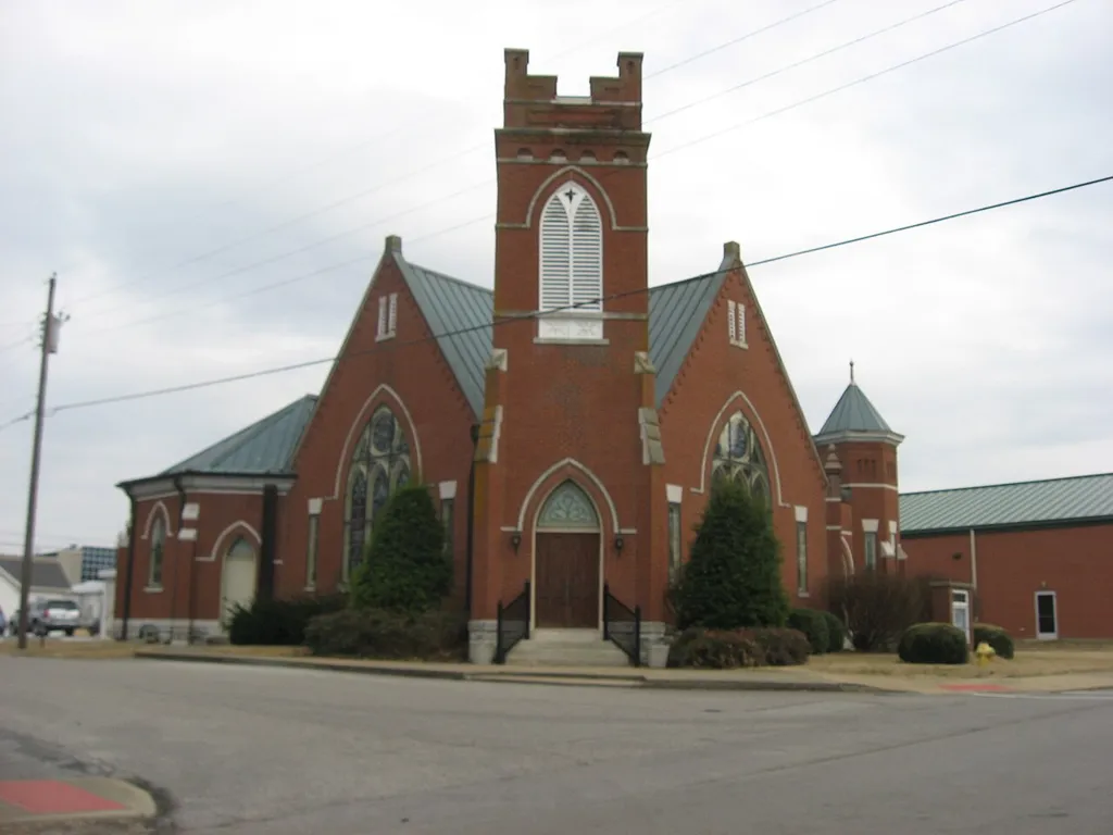 Front of the Smiths Grove Baptist Church, located on the southeastern corner of the junction of Main (Kentucky Route 101) and Second Streets in Smiths Grove, Kentucky, United States. Built in 1898, it is listed on the National Register of Historic Places.