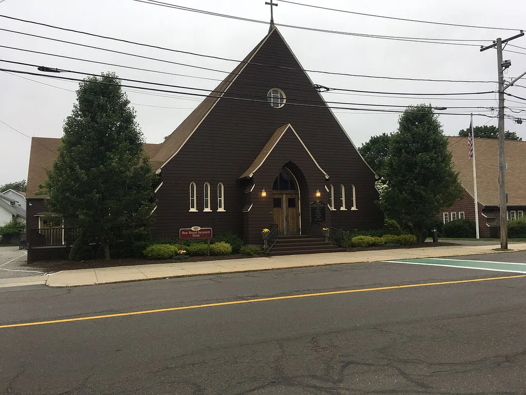 Frontal picture of the Most Blessed Sacrament Church on Main Street in the Greenwood neighborhood of Wakefield, Massachusetts, on June 23, 2018, early evening,