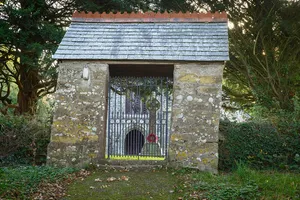 Lychgate and Churchyard Wall Along Road