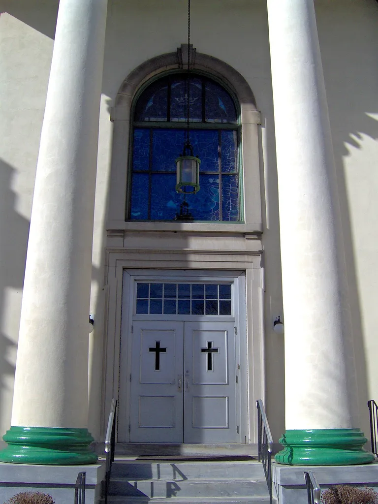 St. George Coptic Orthodox Church in Norristown, Pennsylvania (serving Philadelphia). Here, you can see the church doors with Greek revival columns, as the building was not originally owned by the Copts. The original source of the image can be found here.