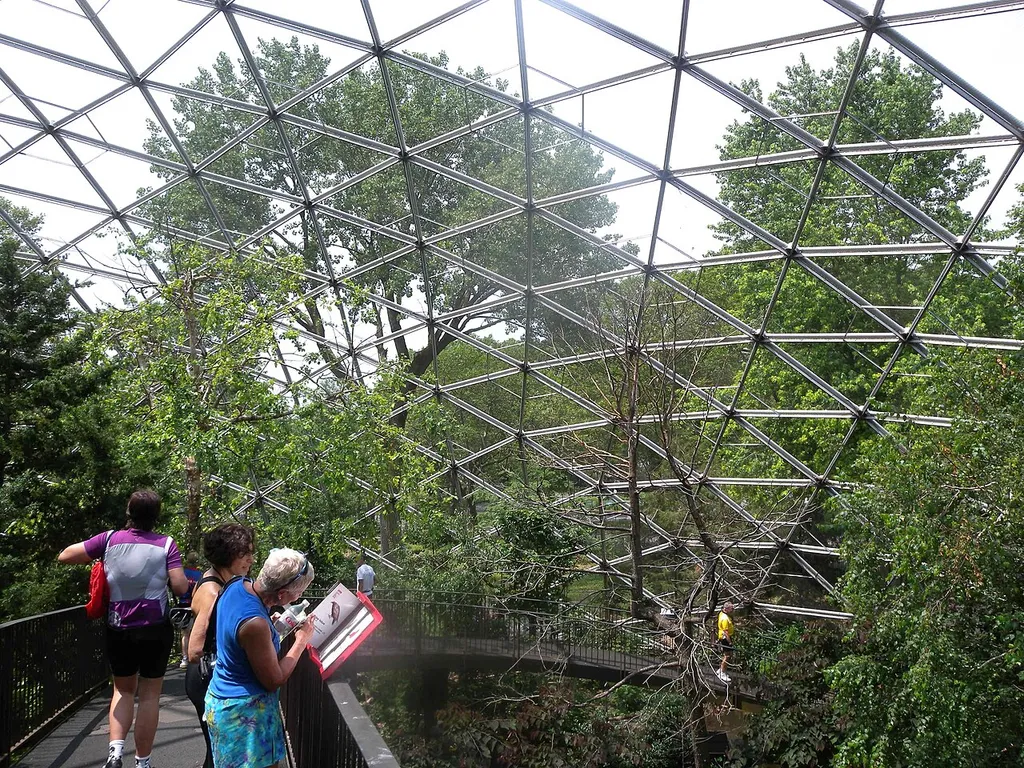 Looking west on the bridge inside the aviary on a cloudy day.