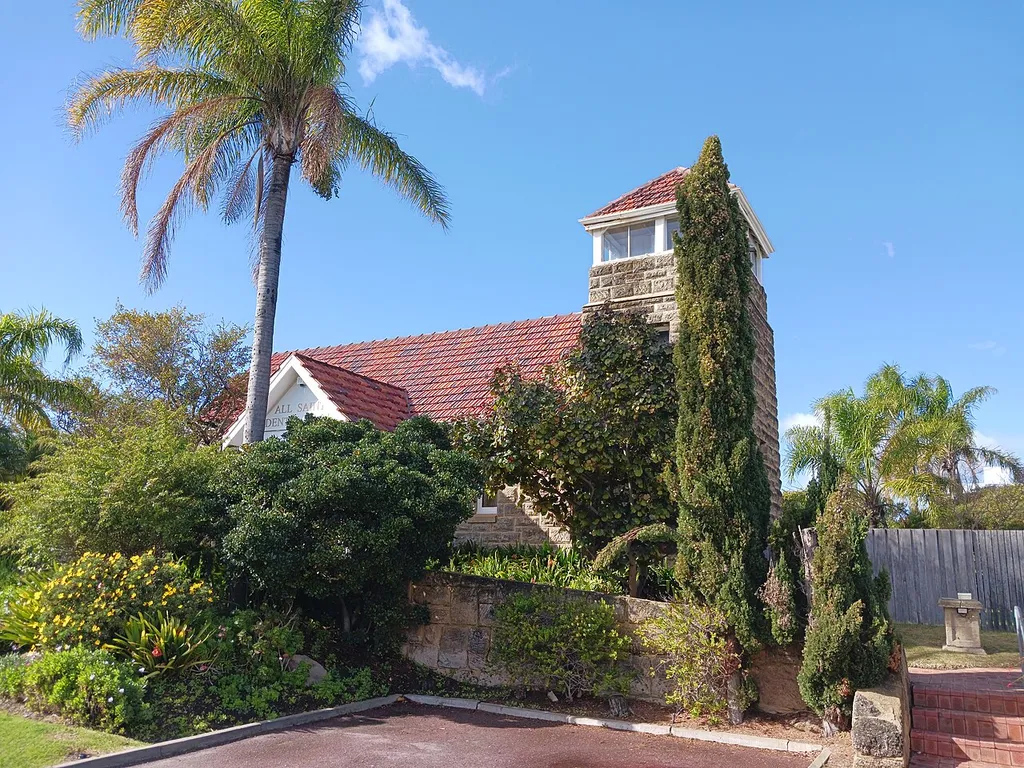 The heritage listed building of the former Anglican Church, Rockingham, Western Australia, now home of All Saints Dental.