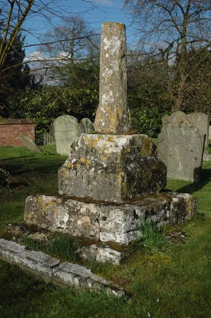 Base and broken shaft of medieval stone cross in St Mary the Virgin parish churchyard, Ripple, Worcestershire