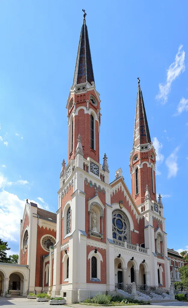 Südostansicht der Versorgungsheimkirche im 13. Wiener Gemeindebezirk Hietzing.Sie wurde im Zuge der Anlage des Lainzer Versorgungsheims als Anstaltskirche von 1902 bis 1904 nach Plänen von Johann Scheitinger errichtet. Die neoromanische Sichtziegelbasilika ist 16 m breit und 38 m lang. Die beiden Türme sind 54 m hoch und weithin sichtbar.