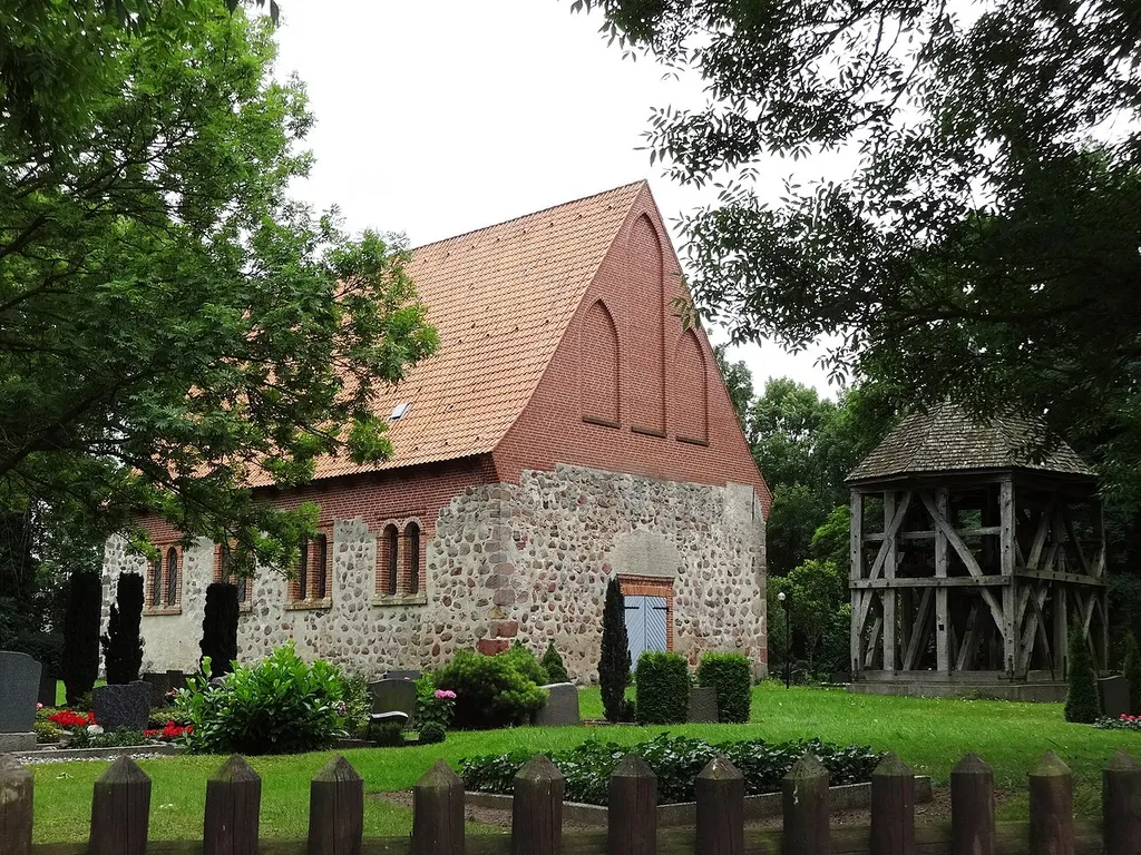 Die evangelische Dorfkirche Schlatkow ist eine Saalkirche aus dem 13. Jahrhundert, die aus Feldsteinen errichtet wurde. Im Inneren befinden sich eine Wandmalerei aus dem 15. Jahrhundert sowie ein Altaraufsatz sowie eine Kanzel aus dem Jahr 1692. Die Orgel von Barnim Grünberg stammt aus dem 1863. Auf dem Friedhof befindet sich ein freistehender Glockenstuhl mit drei Glocken.