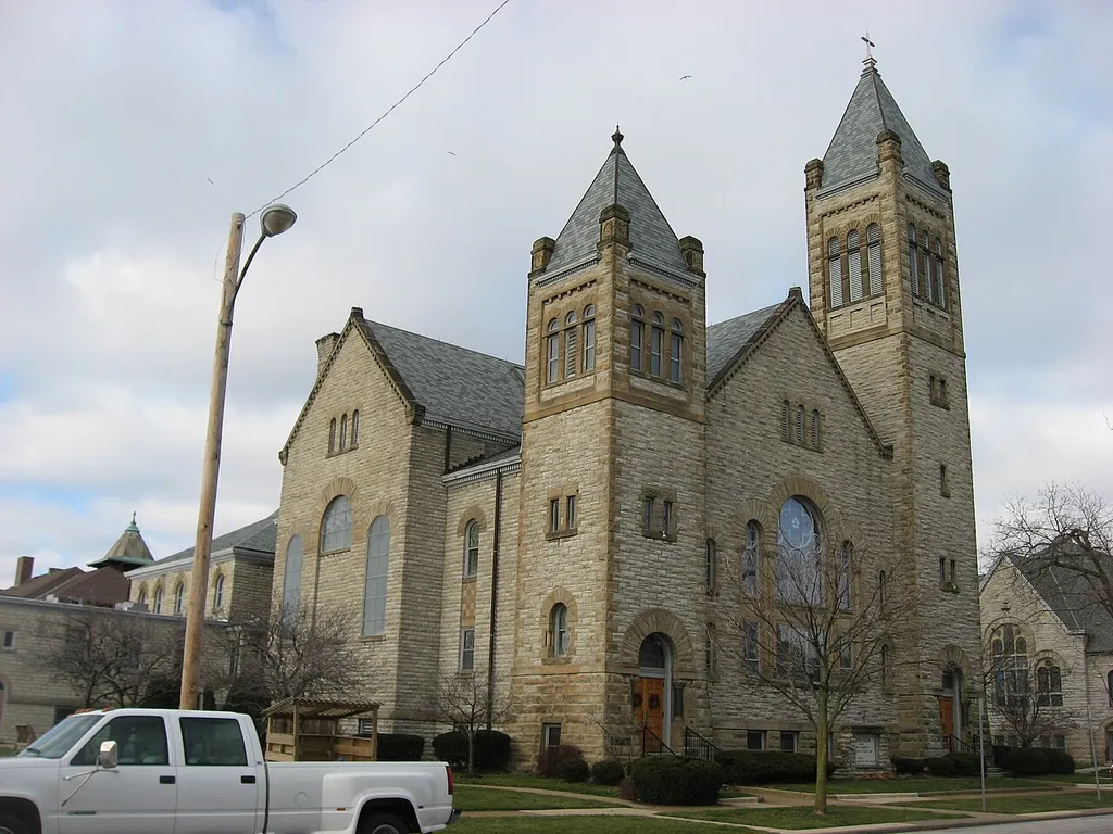 Front and southern side of Zion Lutheran Church, located at 501-503 Columbus Avenue (State Route 4) in Sandusky, Ohio, United States. Built in 1898, it is listed on the National Register of Historic Places.