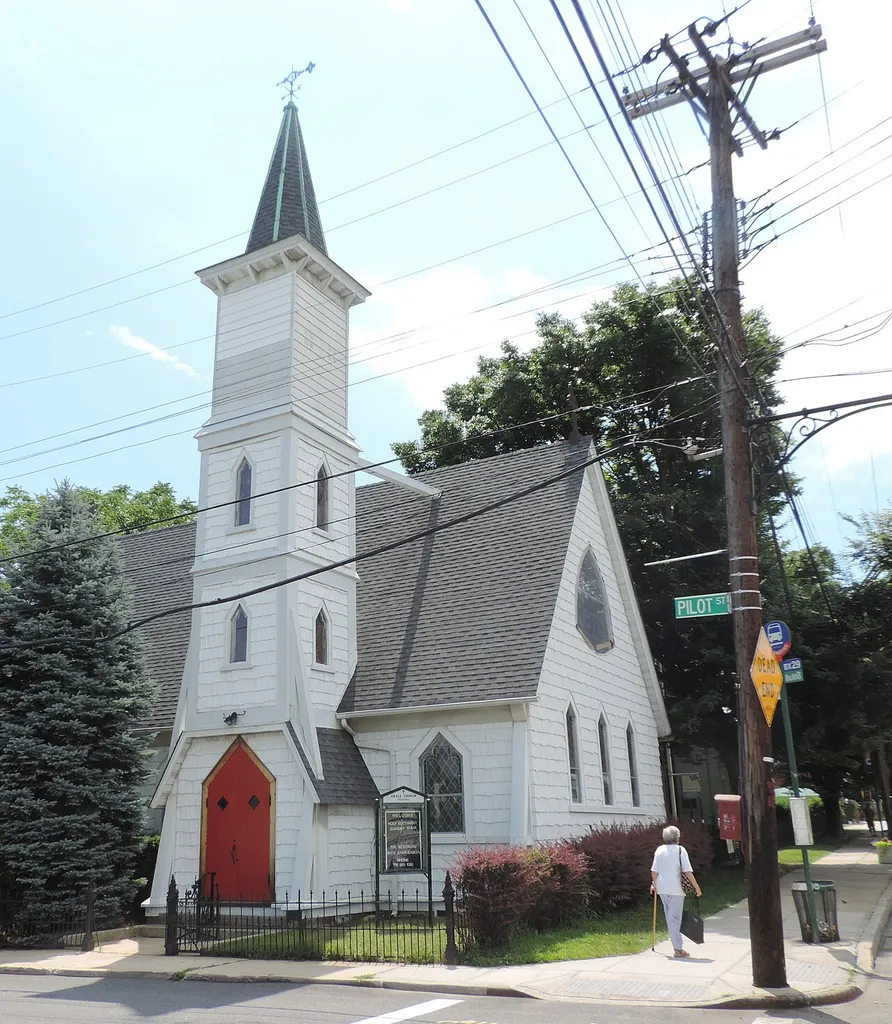 Looking southeast across Pilot Street at Grace Church on a sunny midday. This is an image of a place or building that is listed on the National Register of Historic Places in the United States of America. Its reference number is 06000820 (Wikidata).