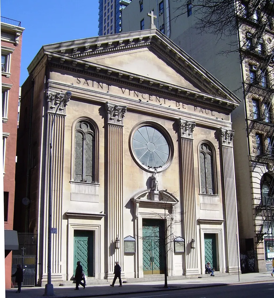 St. Vincent de Paul Church, a Roman Catholic church at 123 West 23rd Street between the Avenue of the Americas (Sixth Avenue) and Seventh Avenue in the Chelsea neighborhood of Manhattan, New York City, was constructed between 1857 [sic] and 1868, designed by Henry Engelbert in the Neoclassical style. In 1939 the facade was replaced with one designed by Anthony de Pace. (Source: From Abyssinian to Zion (2004)).