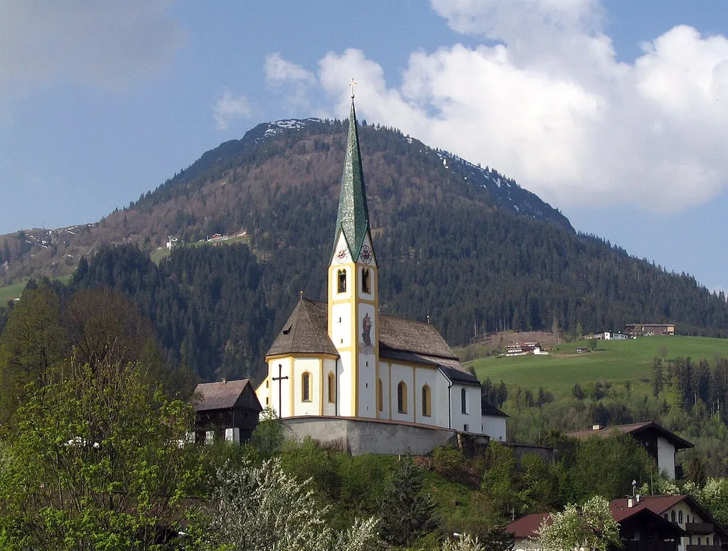 The church in Kirchberg, Tyrol, Austria. In the background the Gaisberg mountain.