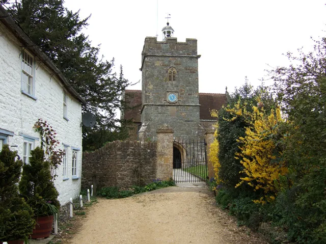 St Lawrence's parish church, Cucklington, Somerset, seen from the south, with Church House on the left