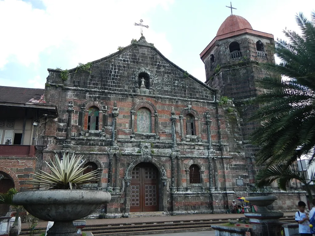 UploadWizard photos --- (general description) of (landmarks, heritage, culture, comprehensive, photography) of – the Nagcarlan Cocpit Arena and the – Vicariate of San Bartolome Apostol - San Bartolome Apostol Parish Church of Nagcarlan - belongs to the Roman Catholic Diocese of San Pablo [1] -- Nagcarlan, Laguna [2] Episcopal District III [3] Vicar Forane: Father Larry R. Abayon Address: Poblacion, Nagcarlan 4002 Laguna, Philippines Feast day: August 24 Parish Priest: Father Larry R. Abayon, VF (Note: I decided to come back and re-photograph this historic and imposing Church, for the sun, this time, did shine upon this magnifiscent building, landmark the photos are portraits of its glory).
