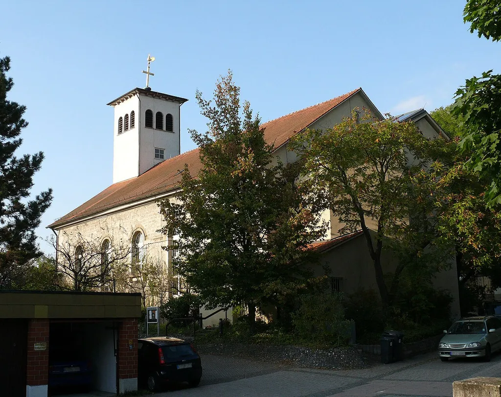 The Martinskirche (Saint Martin church) in Oberesslingen (a district of Esslingen am Neckar, Germany), seen from the cemetery. Yes, the cross with the weathercock is really leaning!