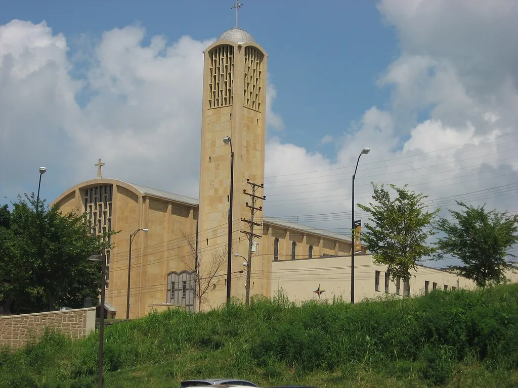 View from the southeast of St. Columba's Cathedral, located on the northeastern corner of the junction of Elm and Wood Streets in Youngstown, Ohio, United States. Completed in 1958, it is the cathedral for the Roman Catholic Diocese of Youngstown.