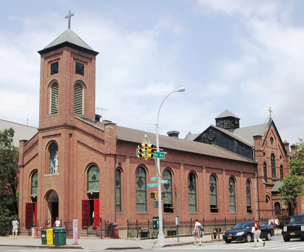 The Church of St. Joseph of the Holy Family is a Roman Catholic parish church of the Roman Catholic Archdiocese of New York, located at 401 West 125th Street at Morningside Avenue in the Harlem neighborhood of Manhattan, New York City. It is the oldest existing church in Harlem and above 44th Street in Manhattan. The Romanesque Revival red brick church was built and dedicated in 1860. It was enlarged in 1871 and altered in 1889 by the Herter Brothers. (Source: From Abysinnian to Zion (2004))