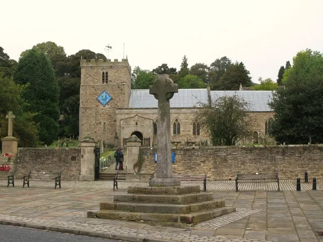 The Church of St. Thomas, Stanhope The base of the broad, rather short W tower, with characteristic windows on the ground floor and first floor, is Norman. Above, pointed twin bell-openings with an Early English shaft (c. 1190-1250). The battlements probably still later. {Pevsner