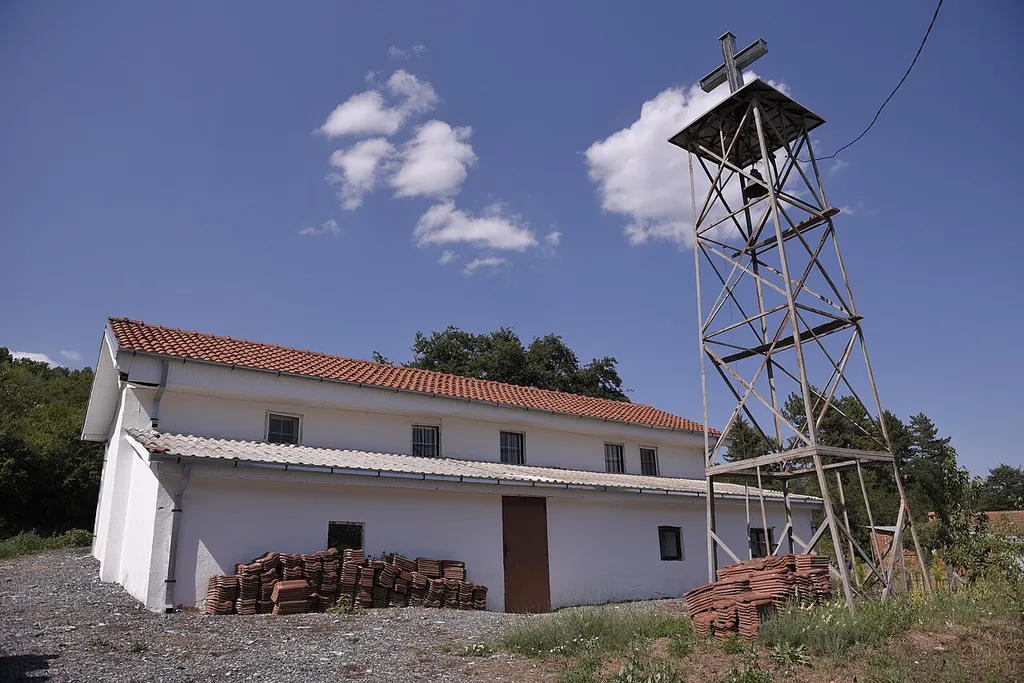 The St. Athanasius Church and its bell tower in the village of Lavci, Resen Municipality.