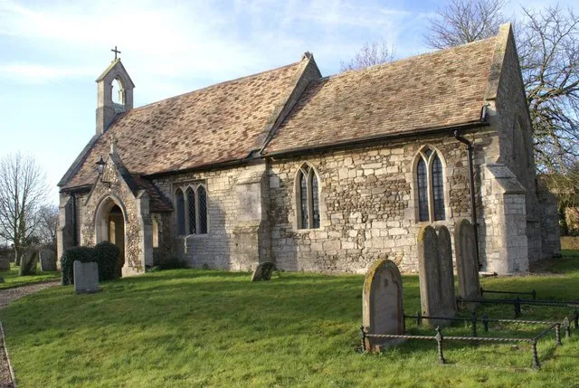 St Giles' parish church, Barham, Cambridgeshire (formerly Huntingdonshire), England, seen from the southeast. The bell from the bell-gable is now inside the church.