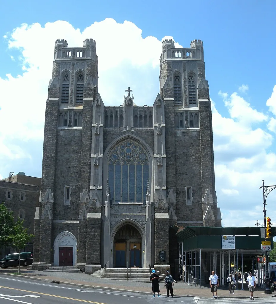 Looking west across University Avenue from Fordham Road at St Nicholas of Tolentine RC Church on a mostly sunny late morning. ZIP 10468.