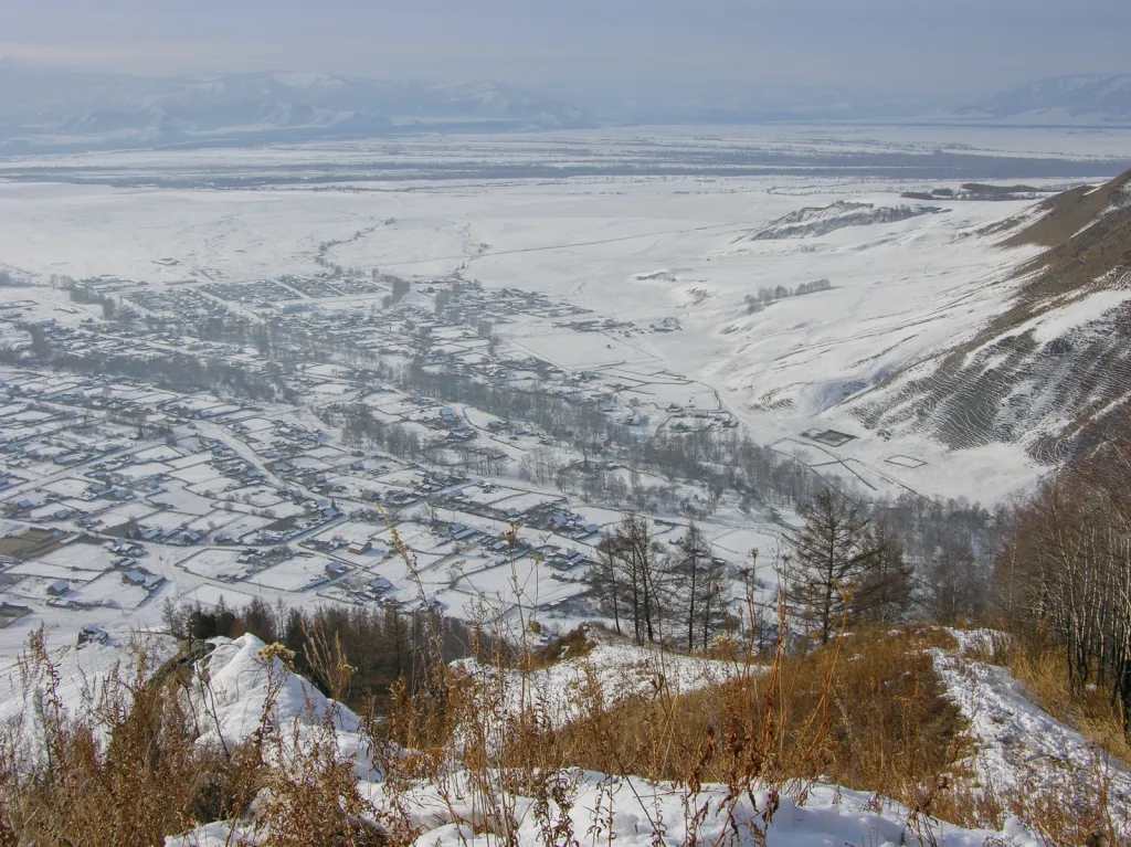 Uimon depression in winter, photo taken from Terekta mountain ridge towards Katun ridge. Chendek village below