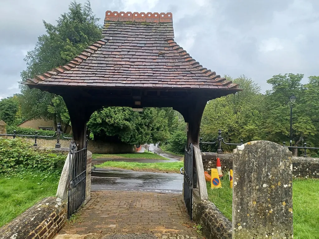 Walls And Lych Gate To Churchyard Of The Church Of St Bartholomew, Haslemere, Surrey, England. Late 19th century, Grade II listed. .mw-parser-output .messagebox{margin:4px 0;width:auto;border-collapse:collapse;border:2px solid var(--border-color-progressive,#6485d1);background-color:var(--background-color-neutral-subtle,#fbfcff);color:var(--color-base,#202122);box-sizing:border-box;border-inline-start-width:8px}.mw-parser-output .messagebox.mbox-small{font-size:88%;line-height:1.25em}.mw-parser-output .mbox-warning,.mw-parser-output .mbox-speedy{border:2px solid var(--border-color-error,#b22222);background:var(--background-color-error-subtle,#ffdbdb);border-inline-start-width:8px}.mw-parser-output .mbox-serious,.mw-parser-output .mbox-delete,.mw-parser-output .mbox-stop{border:2px solid var(--border-color-error,#b22222);border-inline-start-width:8px}.mw-parser-output .mbox-issue,.mw-parser-output .mbox-content{border:2px solid #f28500;background:var(--background-color-warning-subtle,#ffe);border-inline-start-width:8px}.mw-parser-output .mbox-query,.mw-parser-output .mbox-style{border:2px solid #f4c430;background:var(--background-color-warning-subtle,#ffe);border-inline-start-width:8px}.mw-parser-output .mbox-shit{border:2px solid #960;border-inline-start-width:8px}.mw-parser-output .mbox-license{border:2px solid #88a;border-inline-start-width:initial}.mw-parser-output .mbox-legal{border:2px solid var(--border-color-notice,#666);background:var(--background-color-base,#fff);border-inline-start-width:8px}.mw-parser-output .mbox-honor{border:2px solid #ca3;background:var(--background-color-warning-subtle,#fcf4db);border-inline-start-width:8px}.mw-parser-output .mbox-growth{border:2px solid #8d4;background:var(--background-color-success-subtle,#d5fdf4);border-inline-start-width:8px}.mw-parser-output .mbox-move{border:2px solid #93c;border-inline-start-width:8px}.mw-parser-output .mbox-protection,.mw-parser-output .mbox-message{border:2px solid var(--border-color-base,#aa