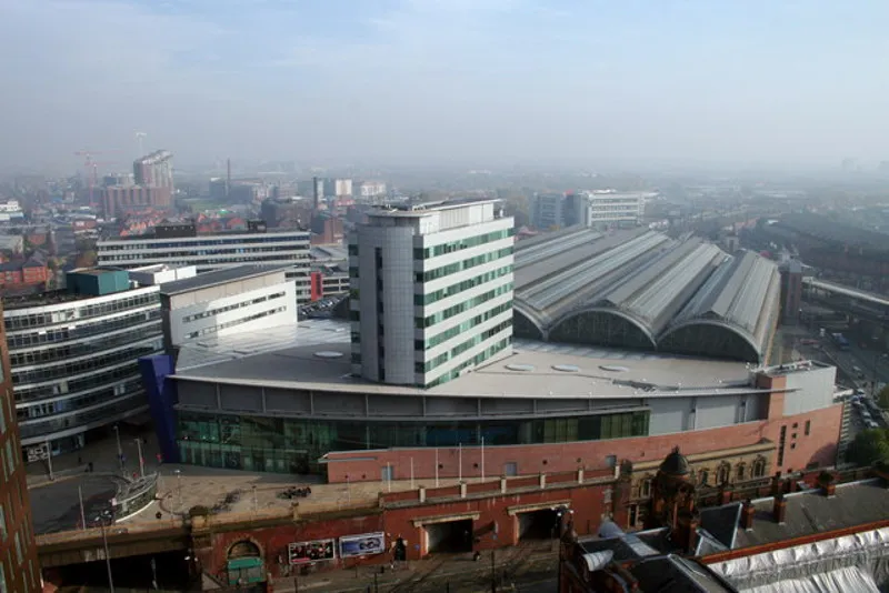 Piccadilly Station Manchester Store Street Station opened in 1842 as the terminus of the Manchester and Birmingham Railway. As the rail network expanded it became London Road Station in 1849. It was rebuilt and became Manchester Piccadilly in 1960 for the new London Midland Region electric service to London. The two openings visible at the bottom centre of the photograph are for the Manchester Metrolink trams which went into service in 1992. The station was extensively modified for the 2002 Commonwealth Games.