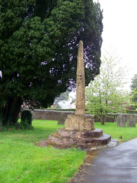 Base and shaft of 14th-century stone cross in St Andrew's parish churchyard, Wiveliscombe, Somerset