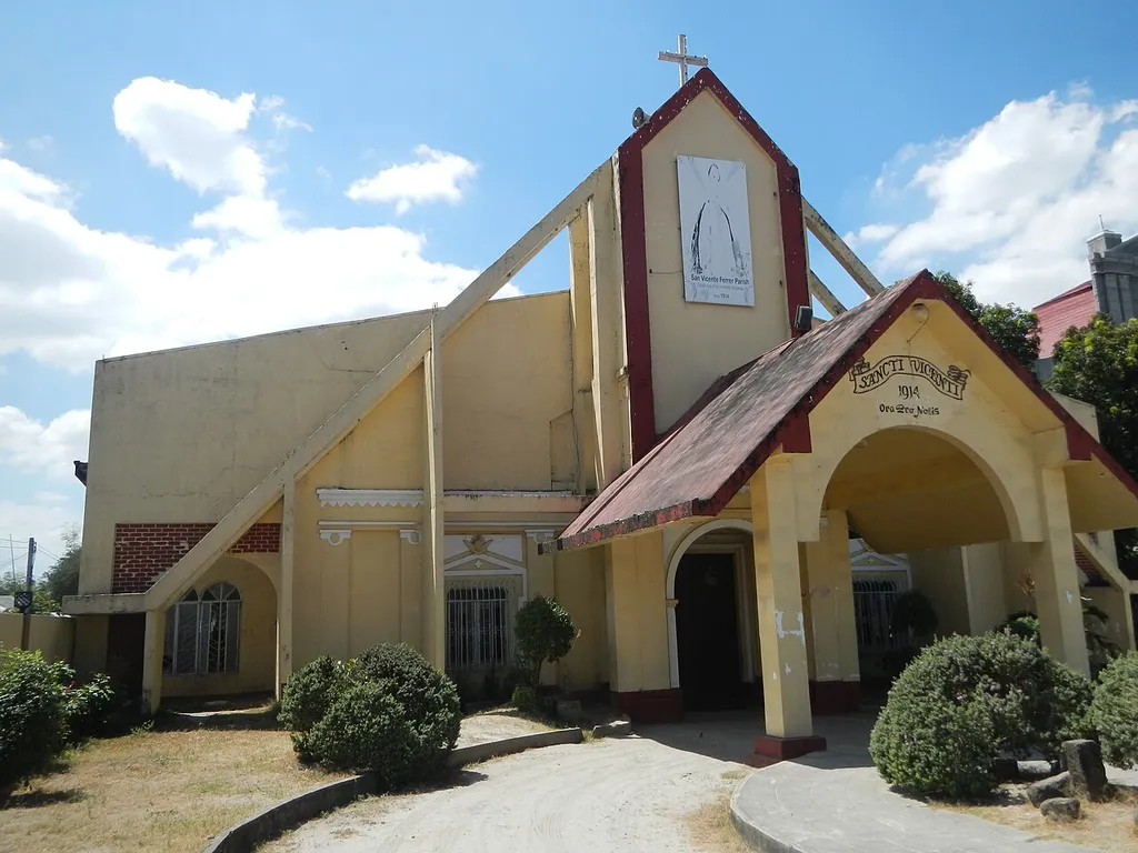 Photos of the Church of San Vicente Ferrer in Barangay Calulut, San Fernando, Pampanga established as a parish in 1914 and the New Church of San Vicente Ferrer being constructed beside it.