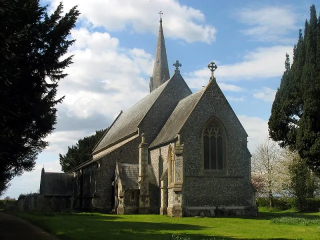 The church is situated in the far south western corner of the grid square. This picture was taken from the south side of the church. Dedicated to St Paul, it is the parish church of Kingsclere Woodlands although confusingly sited at Ashford Hill.