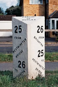 Milepost, Brighton Road, opp. parish church, NE of Longbridge roundabout