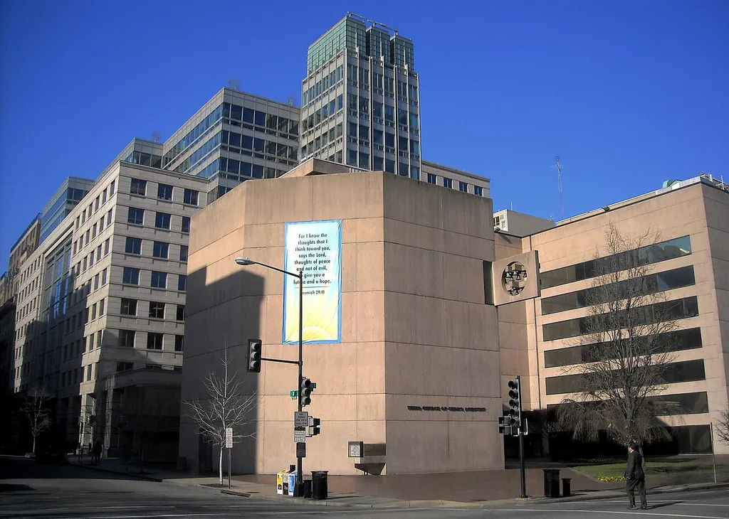 The octagonal building in the foreground is the Third Church of Christ, Scientist (1971) that was located at 900 16th Street, Northwest in downtown Washington, D.C.. Across the small plaza to the right is an office building built as part of the project, and originally used by The Christian Science Monitor. The buildings and plaza were designed by Araldo Cossutta of I.M Pei &amp; Partners. The church building is an example of brutalist ecclesiastical architecture. It was demolished in 2014. The building located behind the church is 1625 Eye Street, an example of postmodern architecture and currently the 20th tallest building in Washington, D.C. Its 2009 property value is $252,285,000.