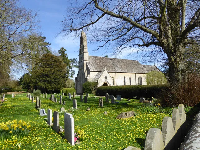 Churchyard and church, Poulton. The Church of St. Michael and All Angels is a grade II listed building of 1873.