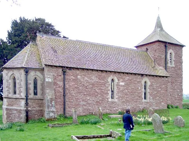 Grendon Bishop Church. Disused church, locked up and even the porch blocked by tin sheeting. No road access. Beautifully quiet setting except for the young excited cattle nearby.