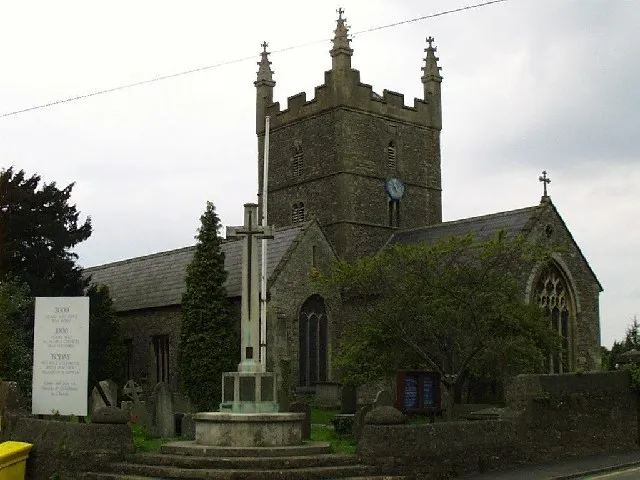 War memorial and St Mary the Virgin parish church, Olveston, Gloucestershire, seen from the southeast