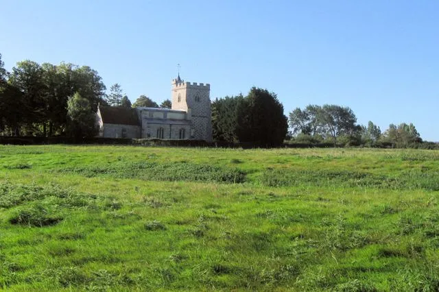 Site of the Medieval Village of Puttenham While there is still a small village South of Puttenham Church the original medieval village is now no more than a number of mounds and dips in this field.