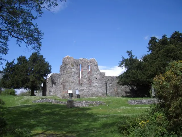 Innisfallen Abbey, Lough Leane. Taken from the jetty. Geographical data: Subject Location Irish: V 92 89E [1000m precision] WGS84: 52:2.8408N 9:34.0804W Photographer Location Irish: V 92 89External link View Direction WEST (about 270 degrees)
